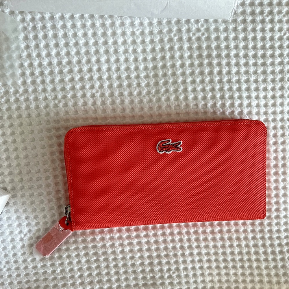 Lacoste zip wallet coral color